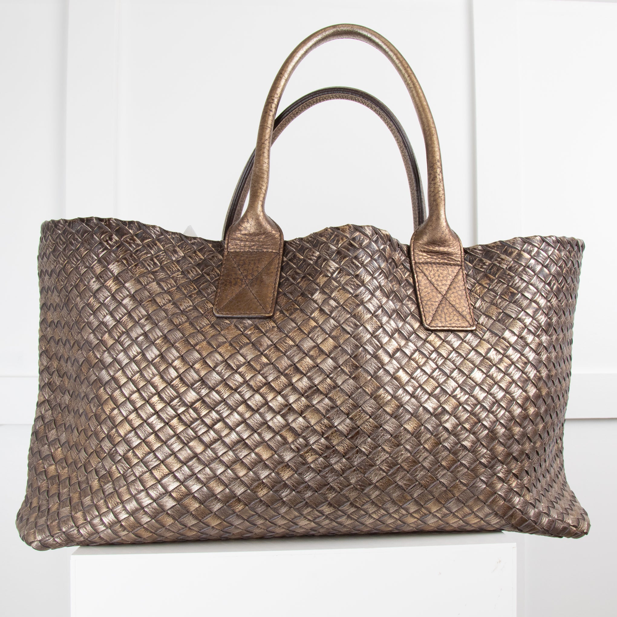 Bottega veneta bag discount brown gold cost