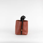 NEOUS Small Leather Bucket Bag In Black And Brown