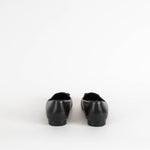 Chanel Black Leather Slip On Loafer with Patent Toe Cap and Camellia Flower