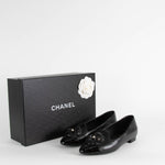 Chanel Black Leather Slip On Loafer with Patent Toe Cap and Camellia Flower