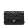 Chanel Black Jumbo Caviar Flap Bag